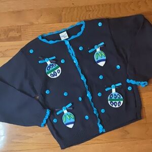 Girls Holiday Sweater with Blue Ornaments and Bows